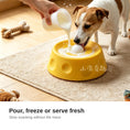 Load image into Gallery viewer, Pouring milk into the treat bowl for a dog