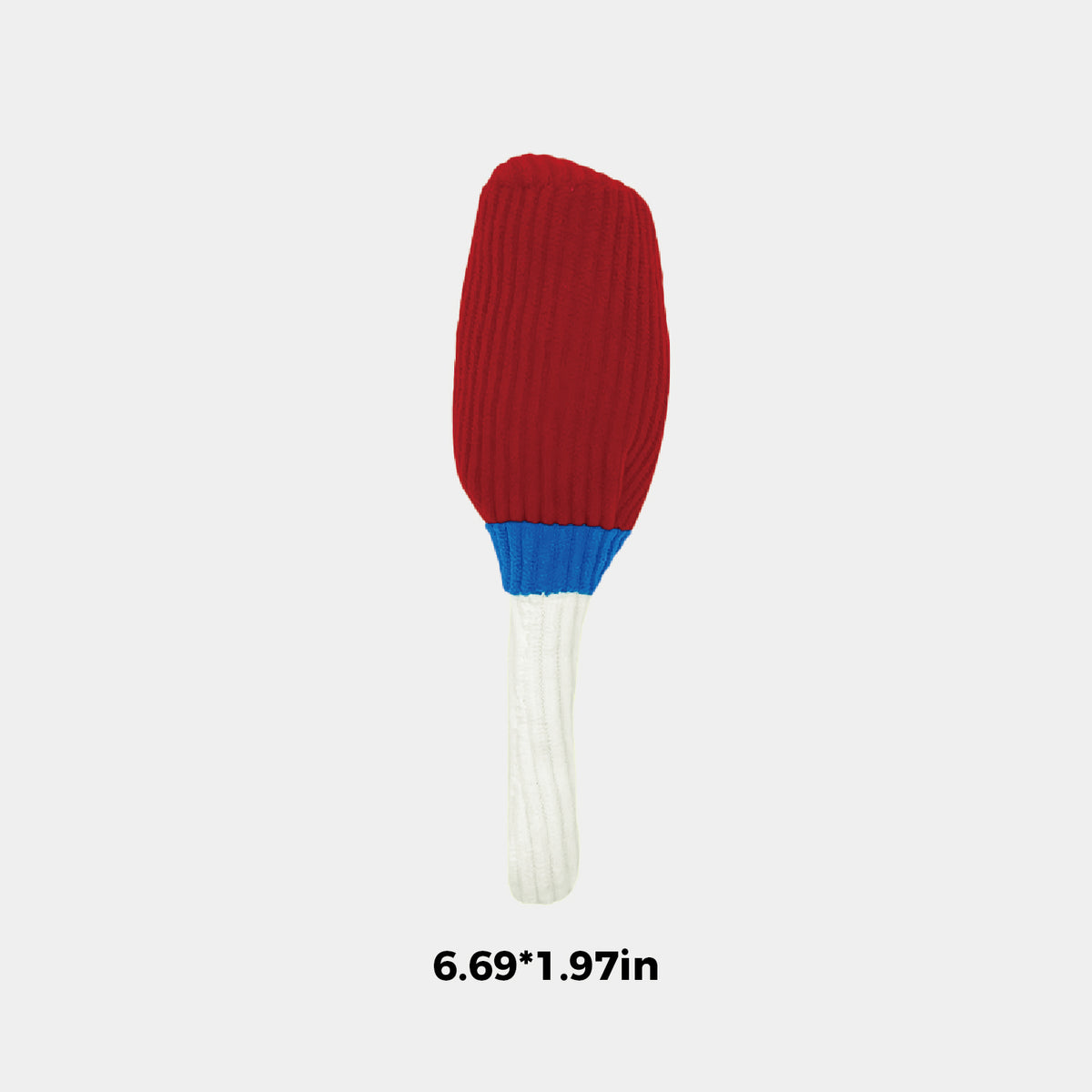 A novelty dog toy shaped like a popsicle, featuring a red ribbed top, a blue band, and a white ribbed handle, shown on a light gray background with size text '6.69*1.