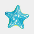 Load image into Gallery viewer, A starfish-shaped inflatable pool float in bright turquoise blue with embedded glitter, featuring a thin yellow edge, shown on a solid light gray background.

