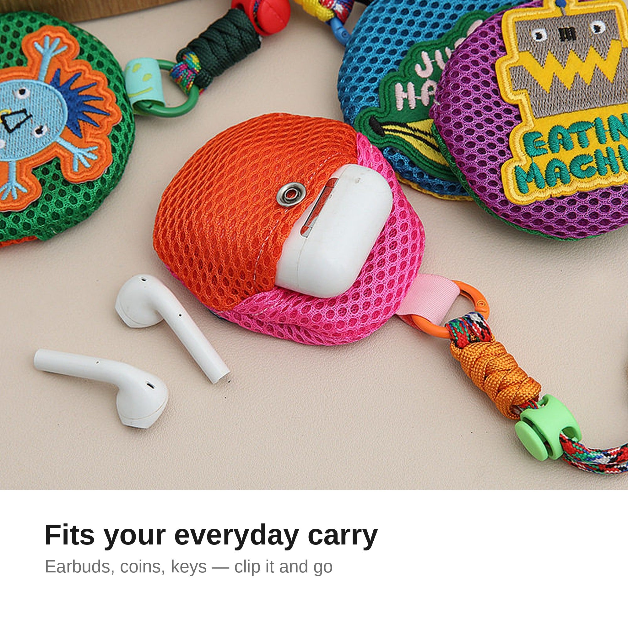 Mesh pouch keychain holding wireless earbuds