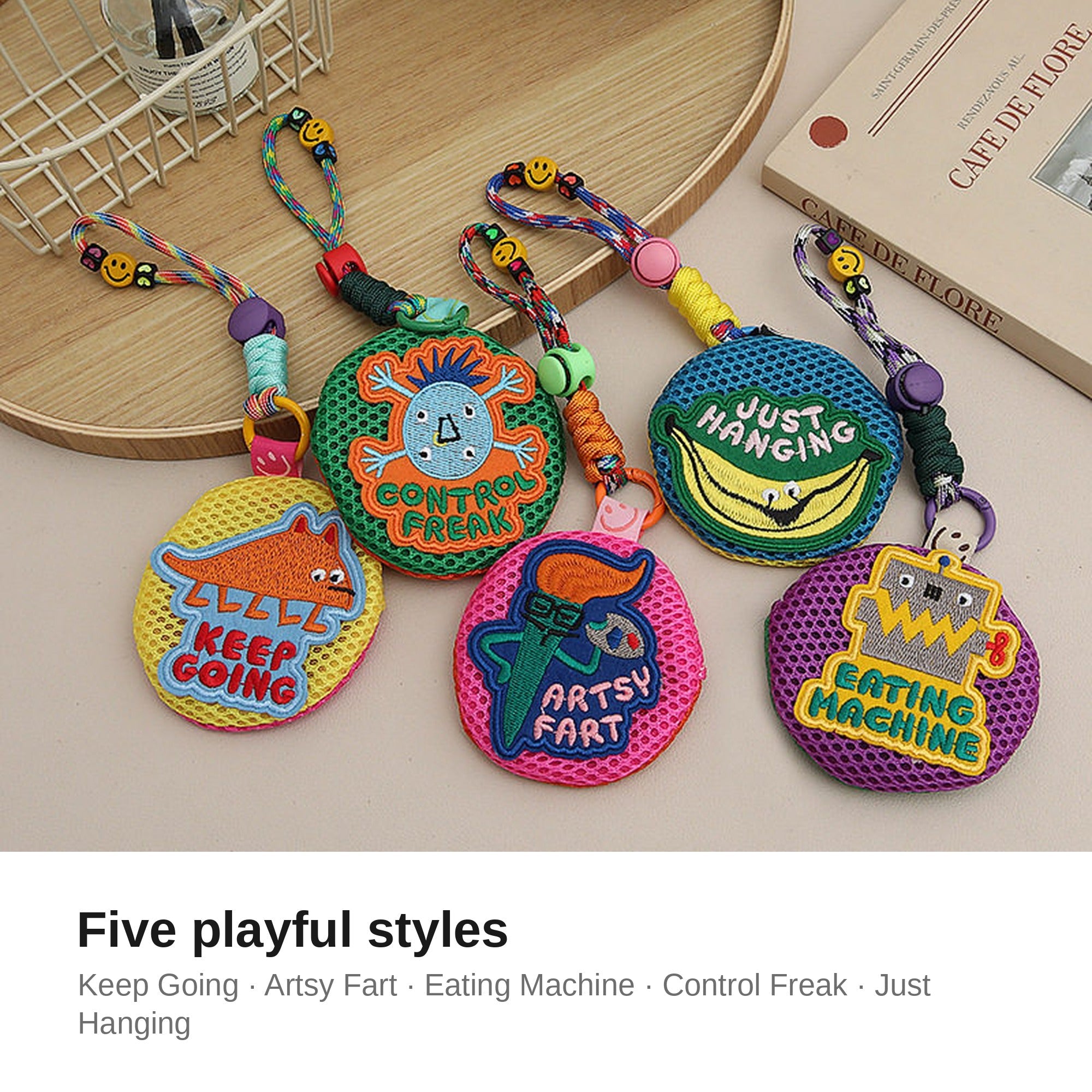 Five playful styles of embroidered pouch keychains